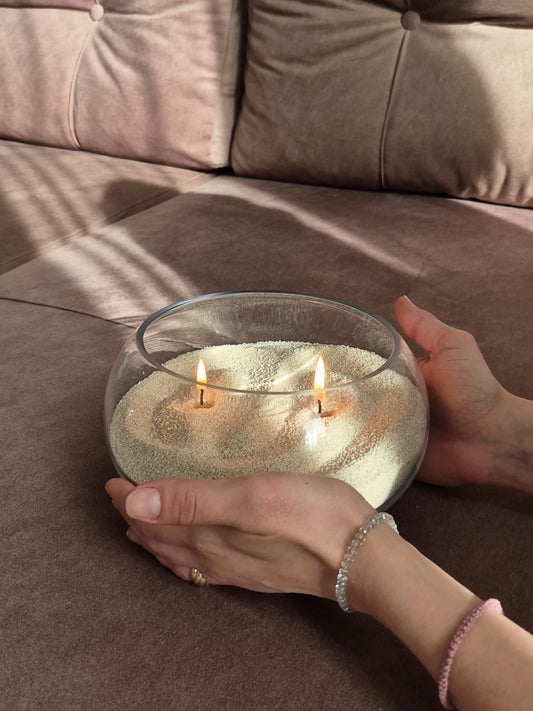 Prelepa dekorativna opuštajuća peščana sveća.